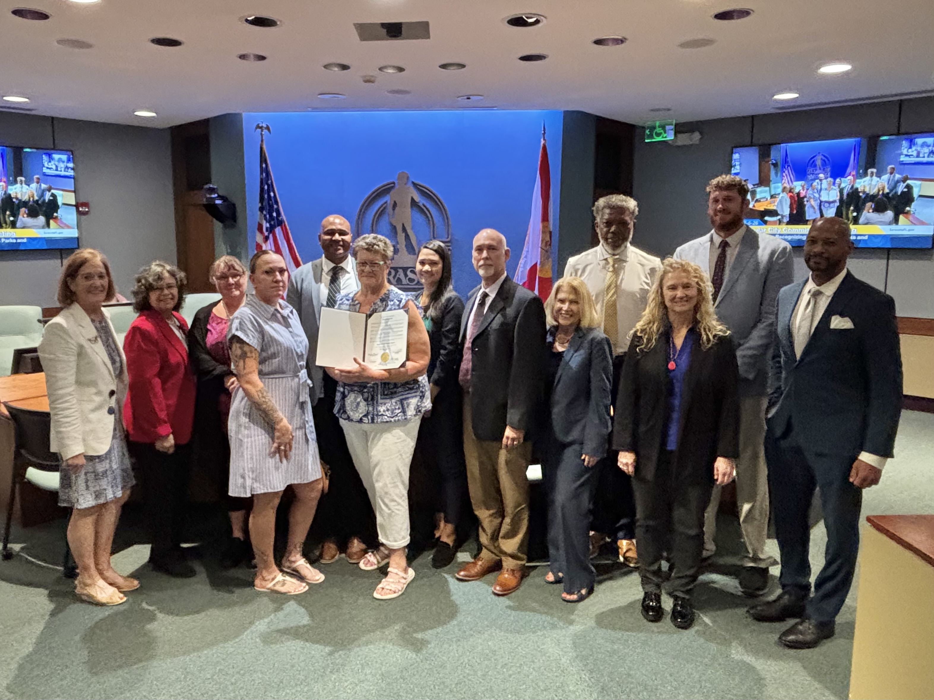 Group photo of Parks and Recreation Department staff with the City Commission