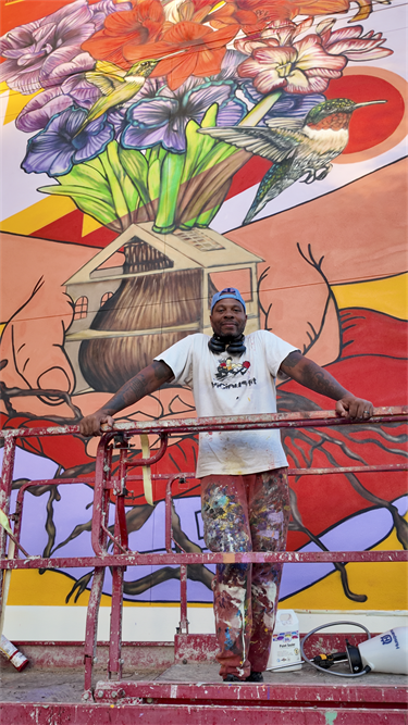 Artist N. Carlos Jefferson in front of his 