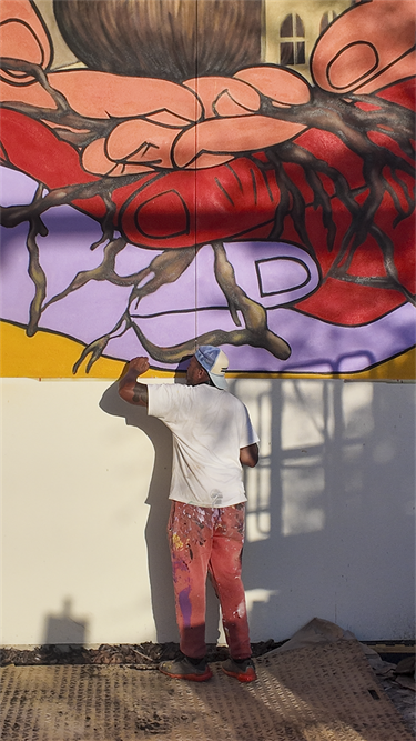 Artist N. Carlos Jefferson in front of his 